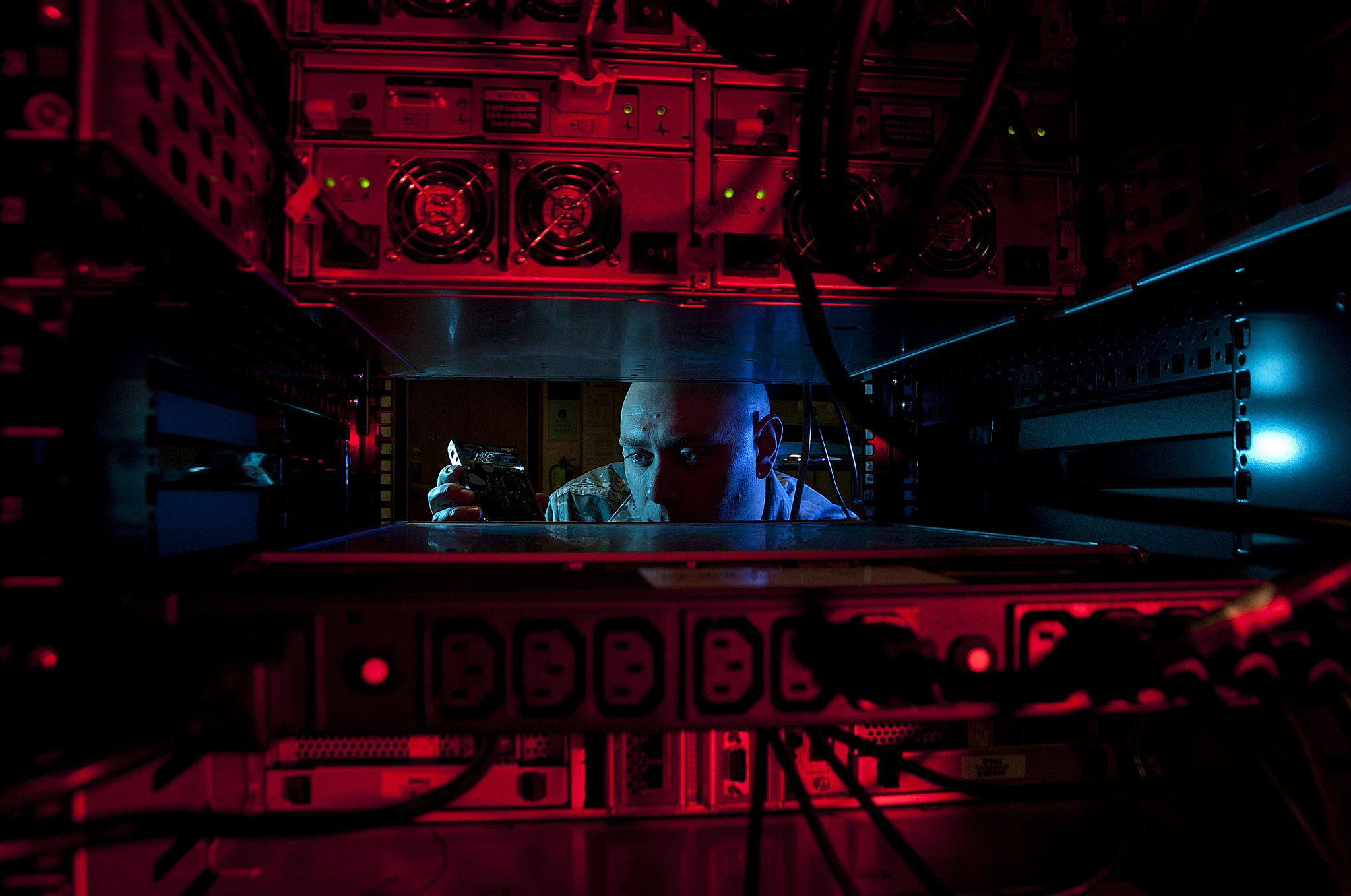 Solider looking into Server box