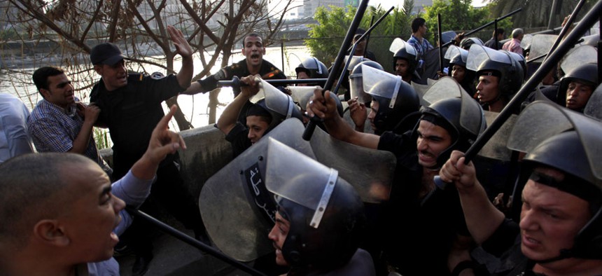Egyptian riot police clash with protestors in Cairo