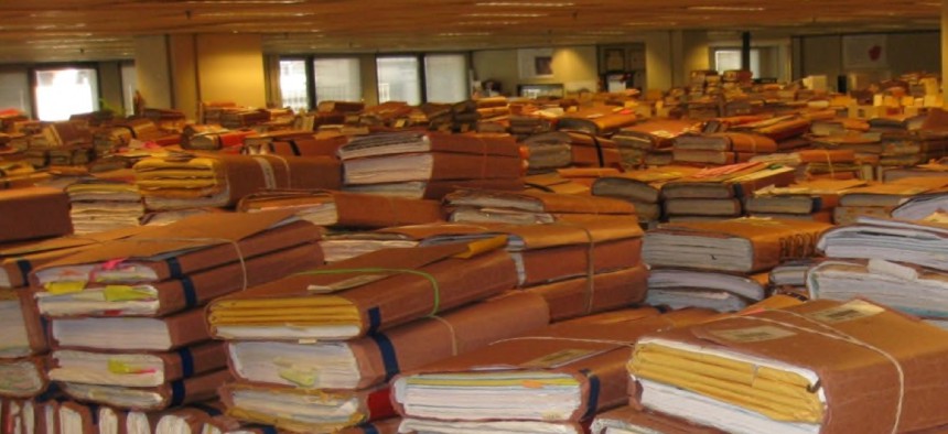 Stacks of claim folders pile up at a VA office in Winston-Salem, N.C. 