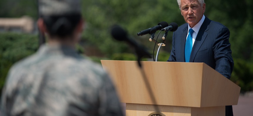 Secretary of Defense Chuck Hagel talks answers a question from an airman at Offutt Air Force Base, Nebraska, on June 20, 