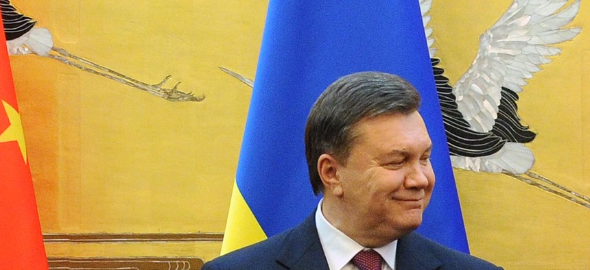 China's president Xi Jinping during a meeting with Ukraine's former President, Viktor Yanukovich