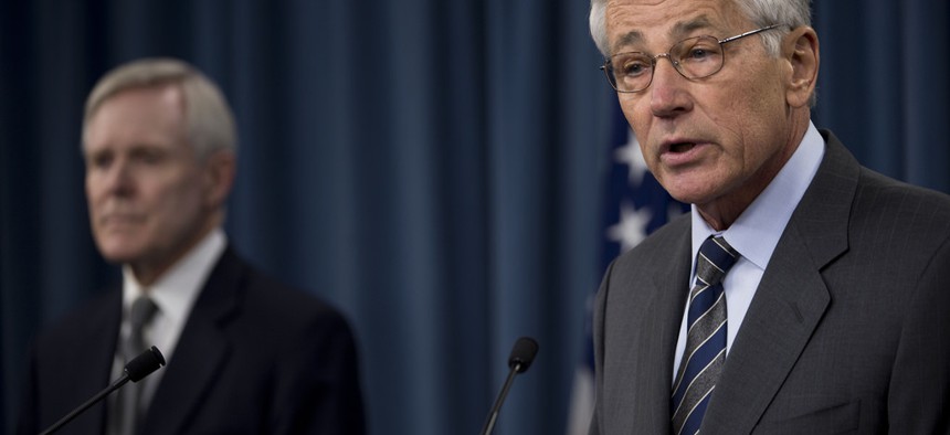 Secretary of Defense Chuck Hagel and Secretary of the Navy Ray Mabus during a press conference at the Pentagon March 18, 2014.