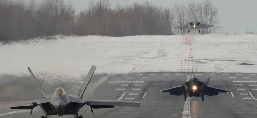 Three F-22s taking off from Elmendorf-Richardson in Alaska