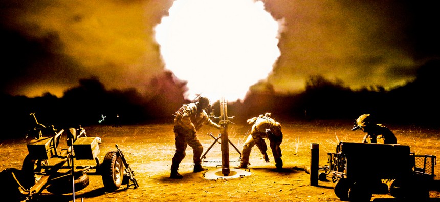 Rangers fire a 120mm mortar during a training exercise at Camp Roberts, Calif. 