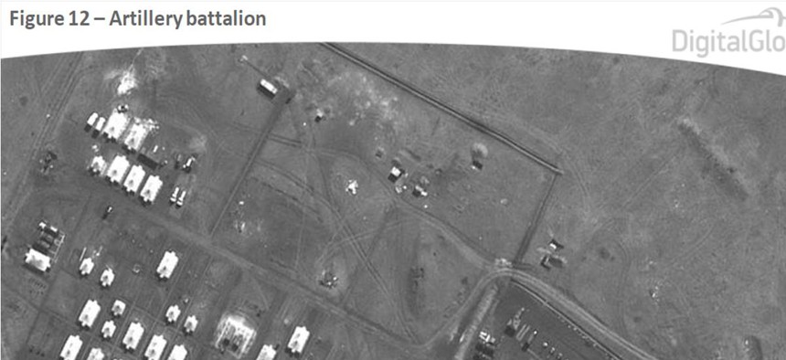 This satellite image, released by NATO, shows Russian artillery battalions at a camp near Ukraine's border on March 27th, 2014. 