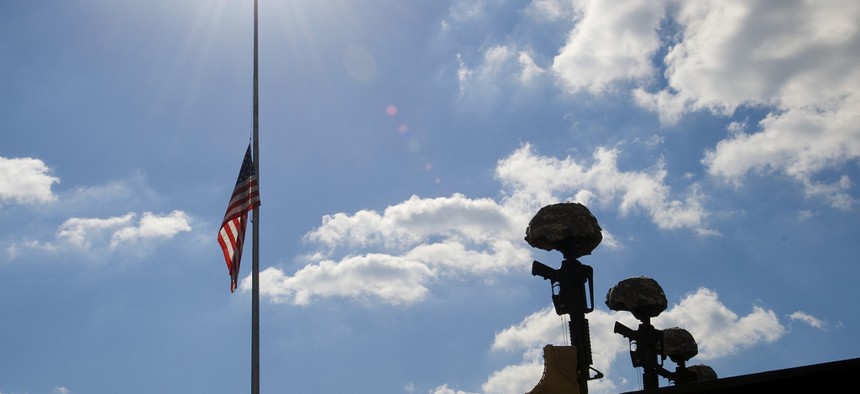 A flag at Fort Hood rests at half mast during a memorial ceremony honoring the victims of the November 5, 2009 shooting