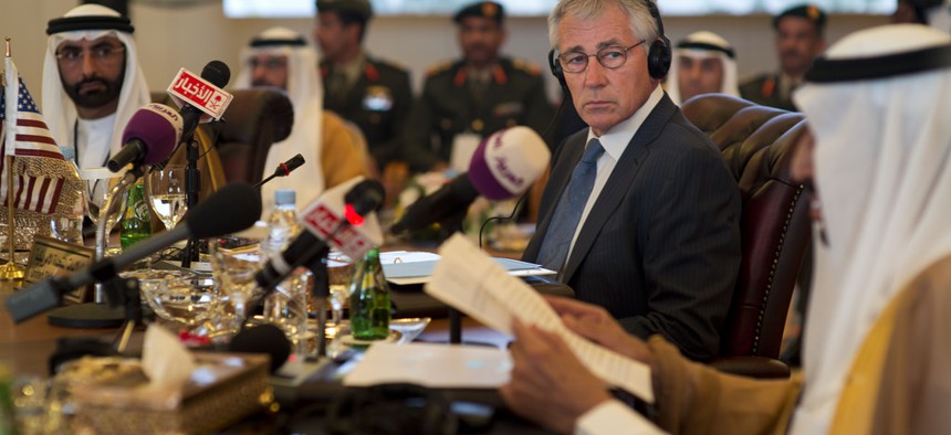 Defense Secretary Chuck Hagel listens to his Saudi counterpart Salman bin Abdulaziz Al Saud at the Gulf Cooperation Council Defense Ministerial in Jeddah, Saudi Arabia, May 14, 2014. 