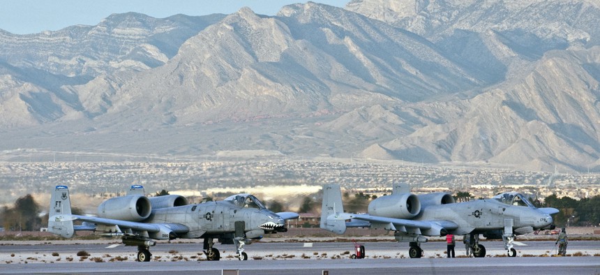Two Air Force A-10s are parked at Nellis Air Force Base, Nev on December 10, 2010.