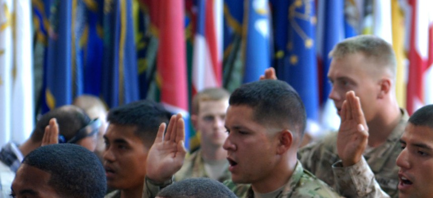 37 U.S. troops from 22 countries take the Oath of Allegiance during a ceremony at Bagram Air Field in Afghanistan on July 4, 2013. 