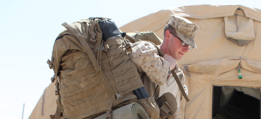 U.S. Marine Cpl. Jeffrey Mount, of Hendersonville, Tenn., prepares to leave Forward Operating Base Nolay in Helmand province on May 2. 
