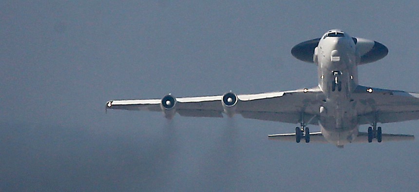 A NATO AWACS plane takes off the NATO Airbase in Geilenkirchen, Germany on March 12, 2014. Russia's readiness to use military force in Ukraine has been a wake-up call for many European countries.