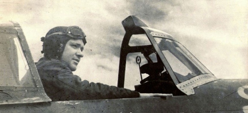 A photo of the author's father, Thomas Tierney, in a P-47 fighter plane during World War 2.