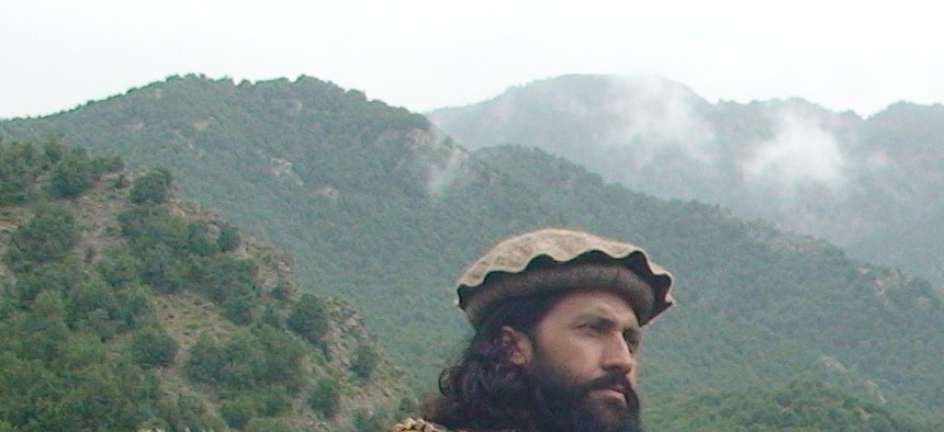 Pakistani Taliban patrol in the tribal region of South Waziristan on August 5, 2012. 