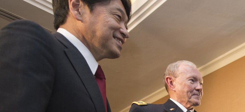 Defense Secretary Chuck Hagel and Joint Chiefs Chairman Gen. Martin Dempsey meet with Japanese Prime Minister Shinzo Abe at the Shangri La Hotel in Singapore, on May 30, 2014.