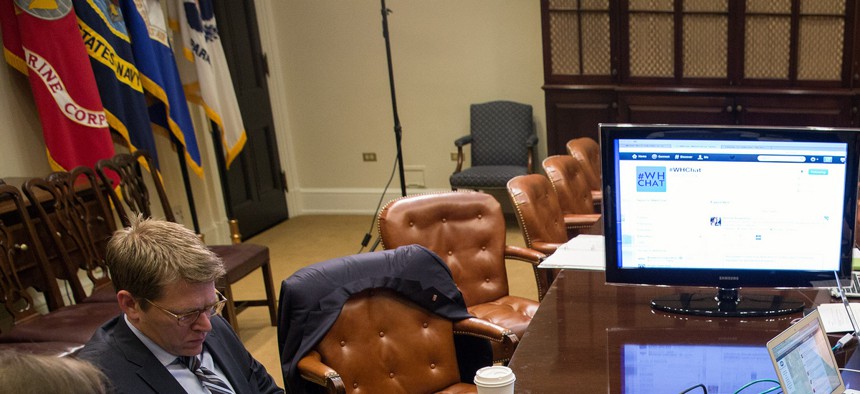 President Obama participates in a live Twitter Q&A in the Roosevelt Room of the White House, on December 3, 2012. 