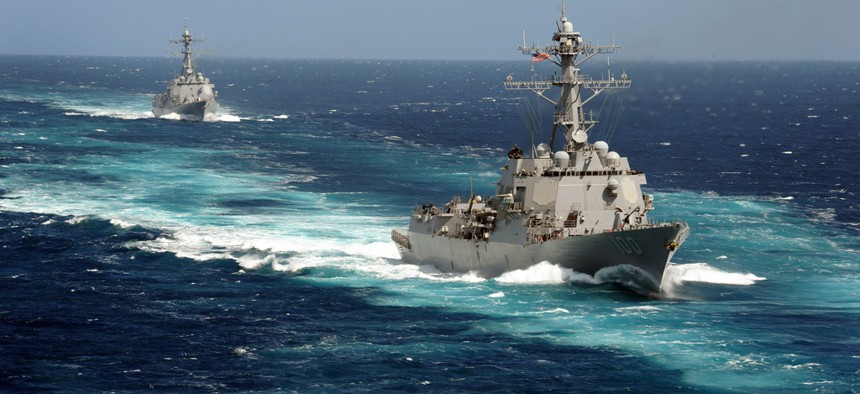 The USS Kidd and USS Pinckney participate in a training unit exercise off of the Southern California coast. 