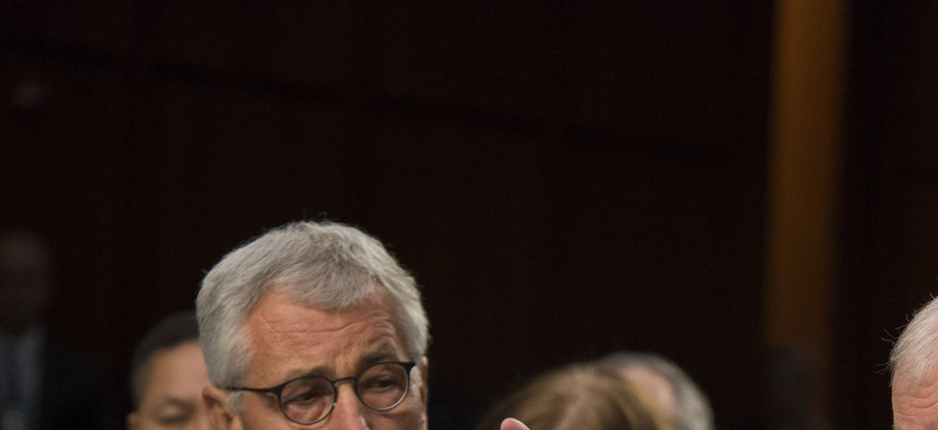 Defense Secretary Chuck Hagel and Joint Chiefs Chairman Gen. Martin Dempsey testify before the Senate Armed Services Committee on the threat of the Islamic State, on Sept. 16, 2014. 
