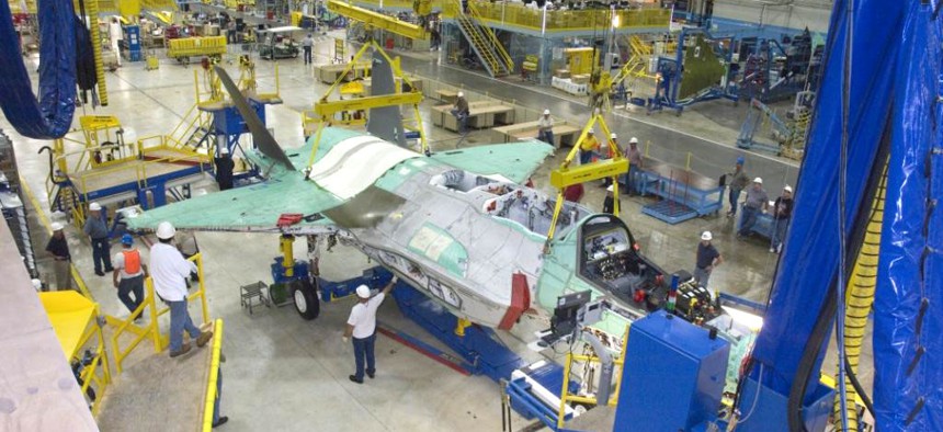 An F-35 under construction sits in a production line in one of Lockheed Martin's factories. 