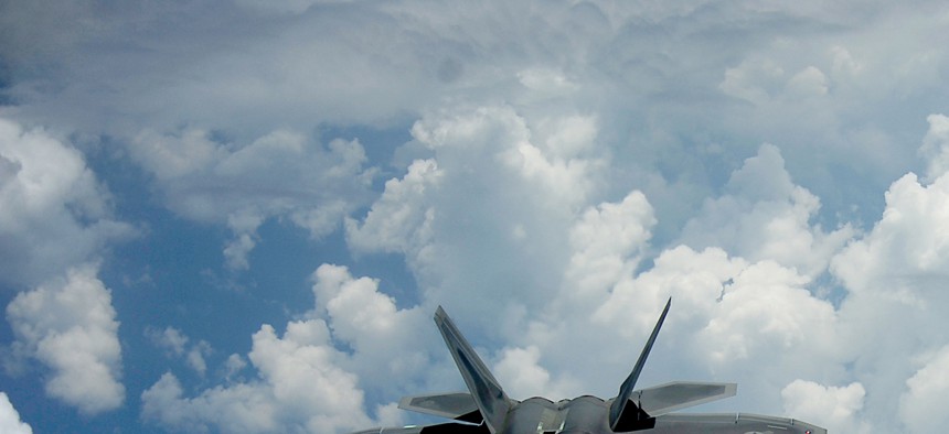 Two of the U.S. Air Force's F-22 Raptors in flight.