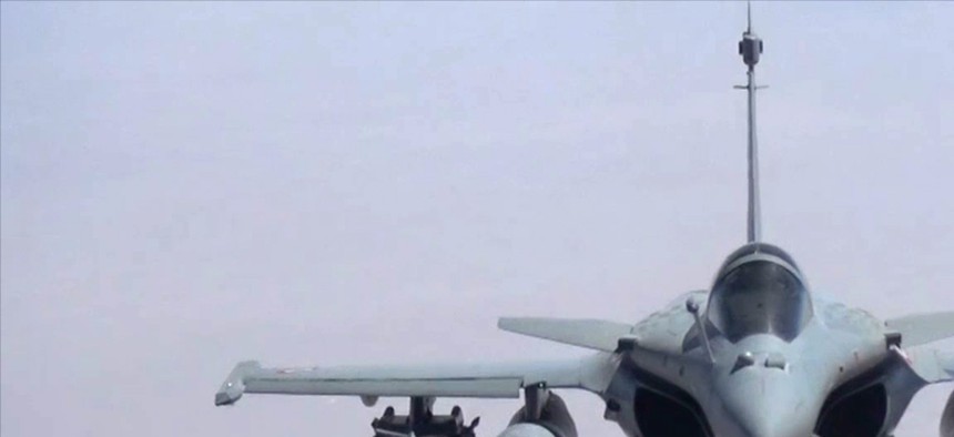 A screen shot from a video published by the French military showing the two Rafale jet fighters in the sky over Iraq during an operation. 