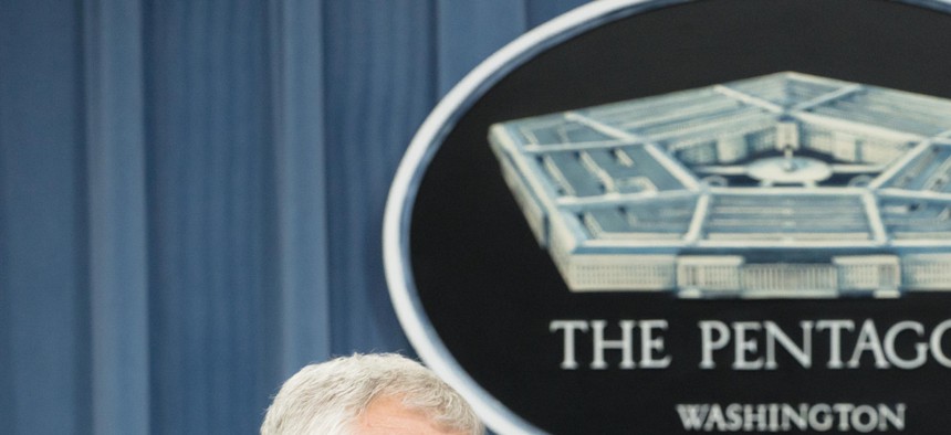 Defense Secretary Chuck Hagel and Joint Chiefs Chairman Gen. Martin Dempsey speak to reporters during a press conference at the Pentagon, on September 26, 2014. 
