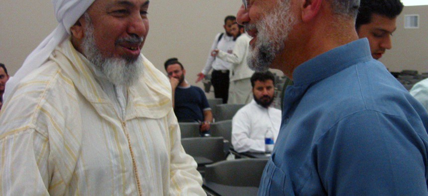 Sheikh Abdullah bin Bayyah, left, during a visit to Canada on January 5, 2012. 