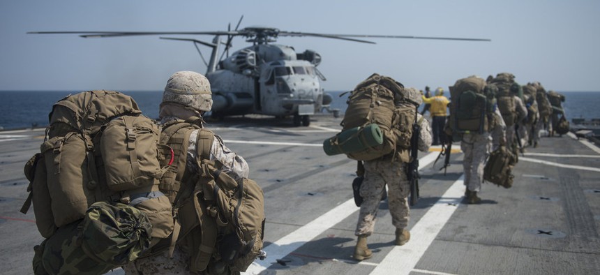 Marines assigned to the 31st Marine Expeditionary Unit load onto a CH-53E Super Stallion during Exercise Ssang Yong, on April 2, 2014. 
