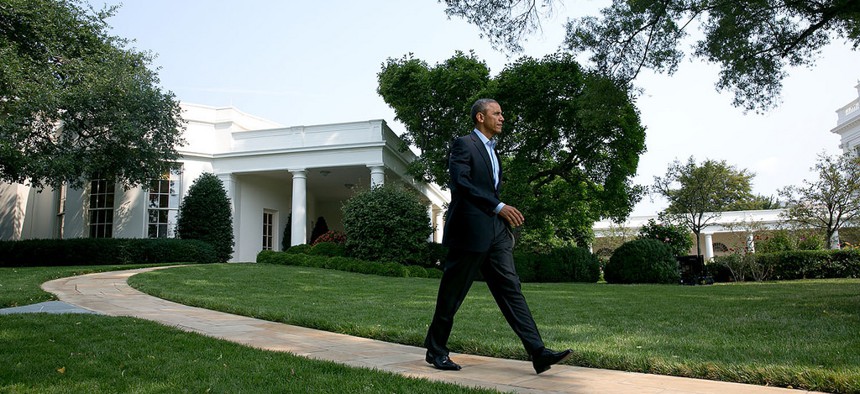 President Obama walks to the podium on the South Lawn of the White House to deliver a statement on the situation in Iraq, on August 9, 2014.