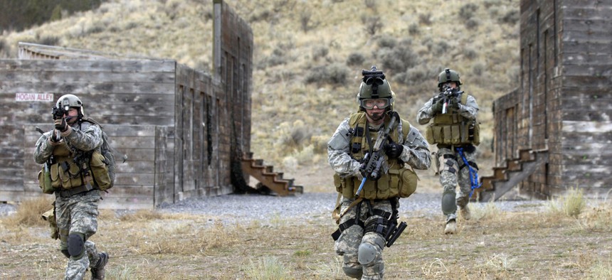 U.S. Army Soldiers with the 19th Special Forces conduct an urban village assault at Camp Williams, Utah. 