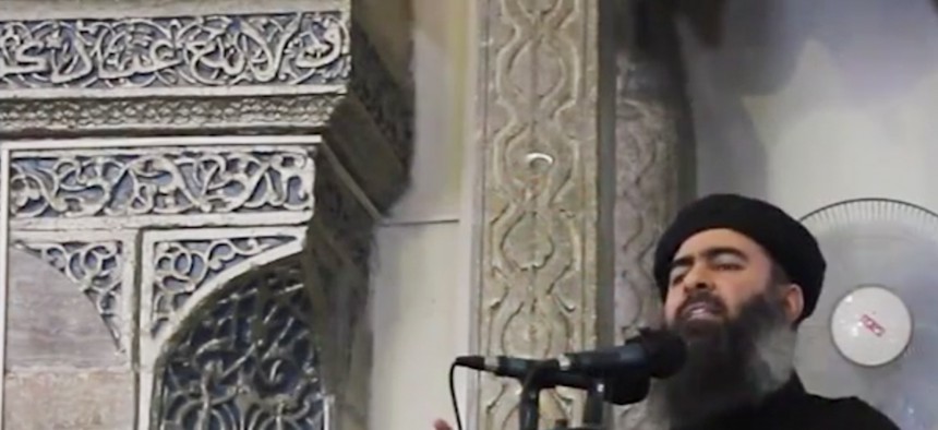 ISIS leader Abu Bakr al-Baghdadi speaks to worshippers at a mosque in Iraq, on July 5, 2014.