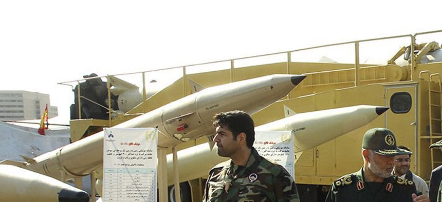 Iran's President Hassan Rouhani visits a defense industry display in Tehran, Iran, on August 24, 2014.