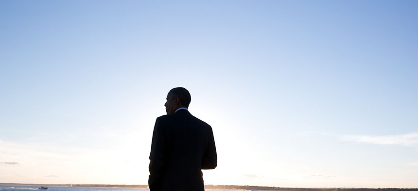 President Barack Obama looks out over the water after arriving aboard Marine One at the Brenton Point landing zone in Newport, R.I., Aug. 29, 2014.