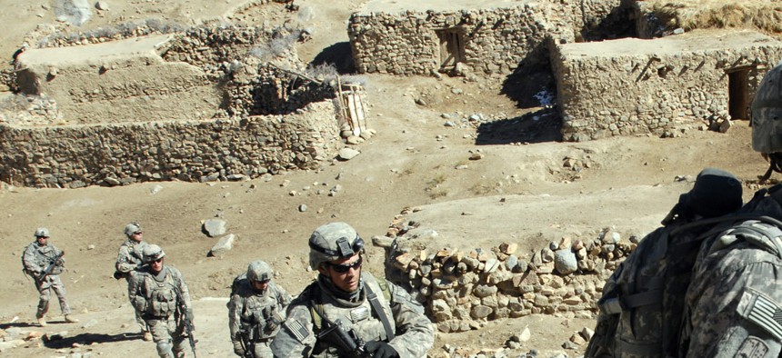 Soldiers with the 101st Airborne Division patrol a small village during an air assault mission in eastern Afghanistan, Nov. 4, 2008.
