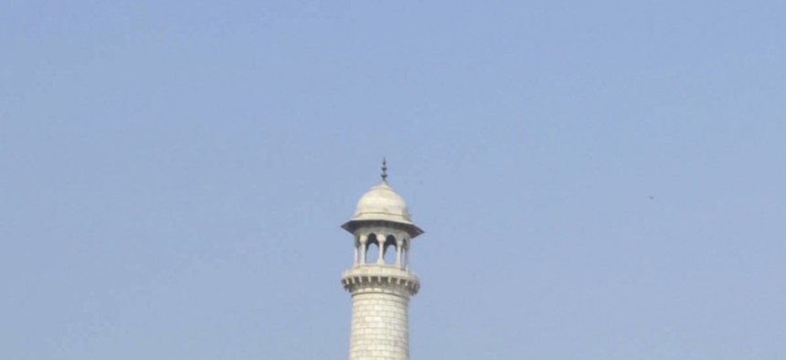 Indian security personnel patrol the premises of the Taj Mahal on the anniversary of the 2008 Mumbai terror attacks.