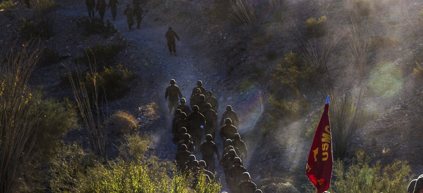 Marines at Marine Corps Air Station Yuma, Ariz., complete a hike at Telegraph Pass, on November 26, 2014.