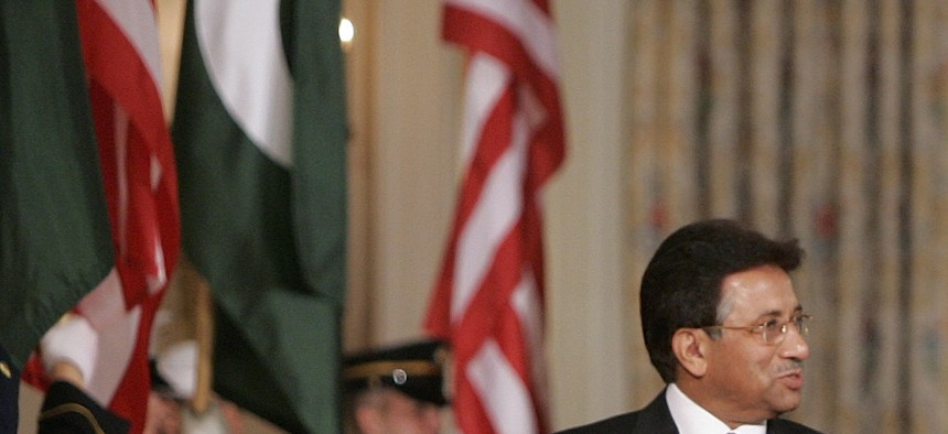 President Bush walks with Pakistan's President Gen. Pervez Musharraf, on September 22, 2006.