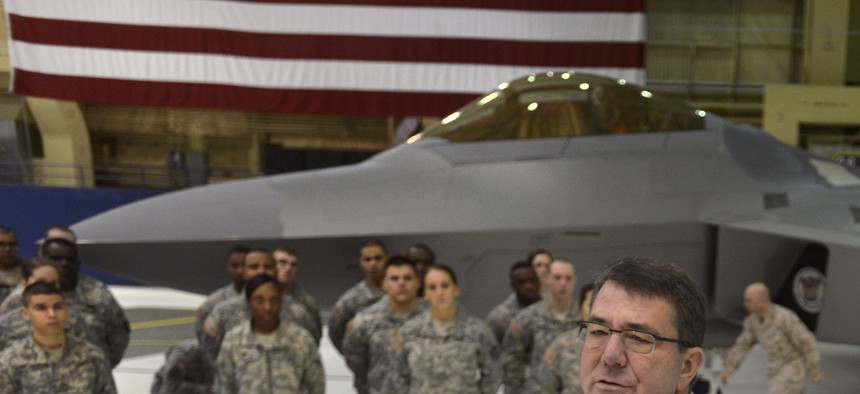Then Deputy Secretary of Defense Ashton Carter visits troops at Joint Base Elmandorf, Alaska, on March 21, 2013.