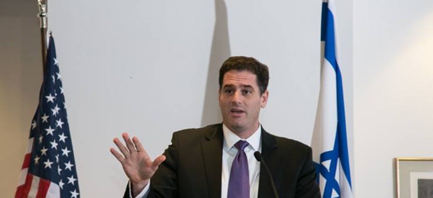 Israel's Ambassador to the U.S. Ron Dermer speaks in front of a crowd at the Israeli Embassy in Washington, D.C. 