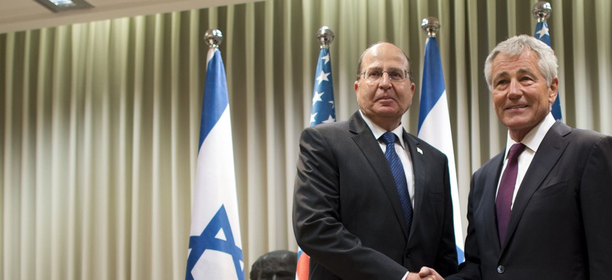 Secretary of Defense Chuck Hagel poses for a photo with Israeli Minister of Defense Moshe Ya'alon in Tel Aviv, Israel, on May 15, 2014.