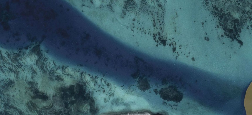 Airbus Defence and Space imagery shows the result of Chinese land reclamation at Hughes Reef in the South China Sea's Union Banks.