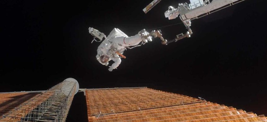 A NASA astronaut goes on a spacewalk to repair a damaged solar panel on the ISS. 