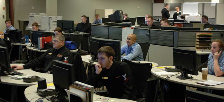 Sailors on the watch floor of the Navy Cyber Defense Operations Command monitor unauthorized activity within U.S Navy information systems and networks. 