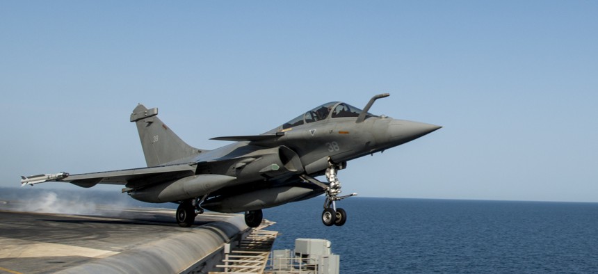 A French navy Rafale Marine aircraft launches from the U.S. Navy aircraft carrier USS Carl Vinson, on March 3, 2015.