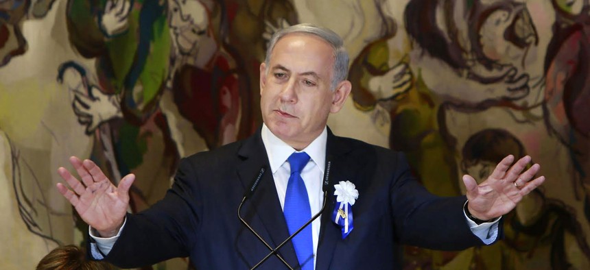 Israel's Prime Minister Benjamin Netanyahu delivers a speech during an event following the first session of the newly-elected Knesset in Jerusalem, March 31, 2015.