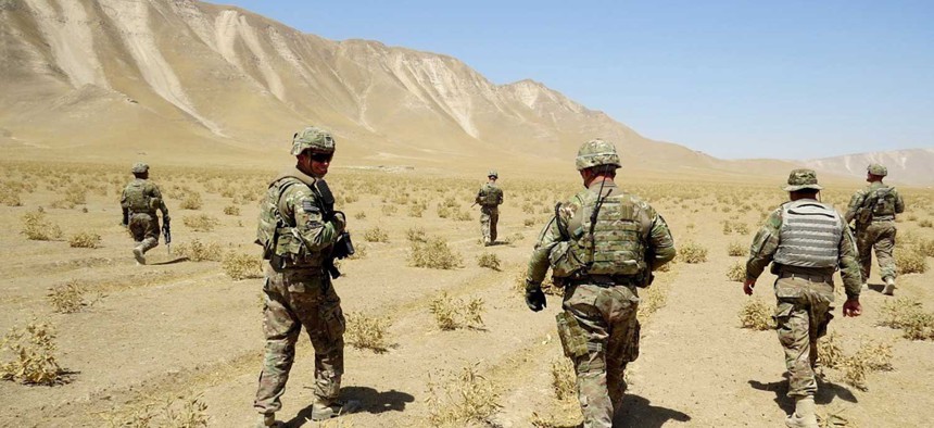 U.S. Soldiers assigned to Bravo Troop, 6th Squadron, 4th Cavalry Regiment, 3rd Brigade Combat Team, 1st Infantry Division, based out of Fort Knox, Ky., patrol the area outside of the proposed range in Kunduz, Afghanistan, July 3, 2013.