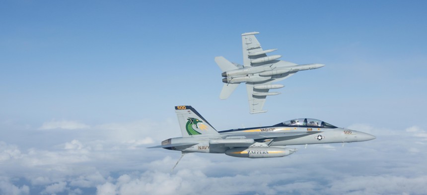 Two F/A-18G Growlers of the U.S. Navy's Electronic Attack Squadron 130