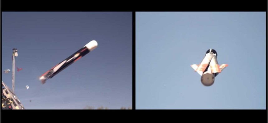 A LOCUST drone is launched out of a tube, during a test by the Office of Naval Research.