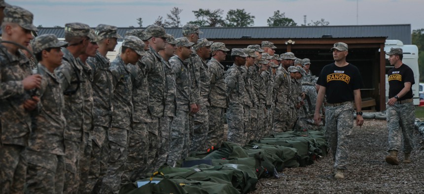 Soldiers conduct a bag drop at the Ranger Training Assessment Course (RTAC) on Fort Benning, Ga., April 3, 2015. 