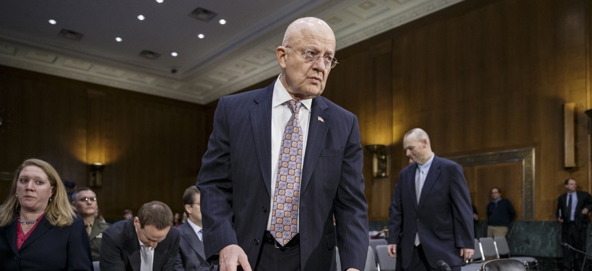 Director of National Intelligence James Clapper arrives on Capitol Hill in Washington, Thursday, Feb. 26, 2015, to testify before the Senate Armed Services Committee.