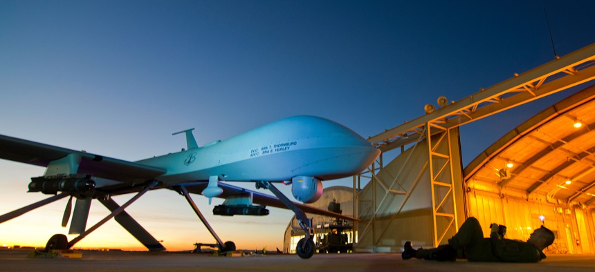 An MQ-1 Predator is shown during post-flight inspection at dusk from Southern California Logistics Airport, formerly George Air Force Base, in Victorville, Calif., Jan. 7, 2012.